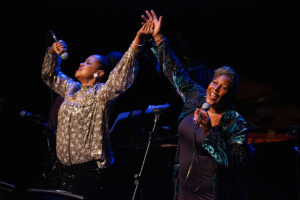 Vimala Rowe and Juliet Roberts singing on stage at Hull Truck Theatre